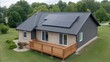© 69 - Modern House with Solar Panels on Roof Surrounded by Greenery and Lawn in Residential Neighborhood