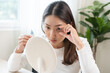 © KMPZZZ - Health care concept, eye problem asian young woman applying, using medical eye drops to treat dry eye and irritation, suffering from irritated eye dry eyes or inflammation, allergy optical symptom.