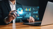 © Dudu - Interactive Data Visualization A Person Interacting with a Holographic Display of Business Analytics, Showcasing the Future of Data Analysis and Strategic Decision-Making