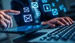 © MDMAHBUBUR - Person using tablet and laptop with glowing email and Linked In icons connected message communication