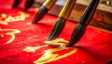 Chinese Calligraphy - Brushes and Red Paper for Lunar New Year.