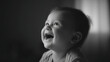 © buraratn - Joyful baby smiles brightly, showcasing pure happiness in soft, monochrome setting. gentle light highlights child features, creating heartwarming and tender atmosphere