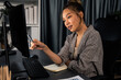 © InfiniteFlow - Beautiful businesswoman working on laptop for marketing plan on social media online, searching data report at over late night time at modern home office, working startup company project job. Infobahn.