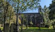 © MikeBeverley - Abandonded Saint John the Baptist Church graveyard, Smallbridge, Rochdale. Derelict St John's chapel building churchyard, graves and gravestones. Summy, grass, trees, greenery. Peaceful gothic chapel
