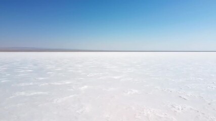 Wall Mural - Wide Shot of an Expansive Salt Flat Stretching to the Desert Horizon simplicity, empty, exploration