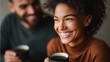 © KKC Studio - Smiling woman enjoying coffee with partner in cozy indoor setting