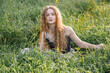 © Светлана  - Fashion portrait of young hippie woman at sunset posing on nature background