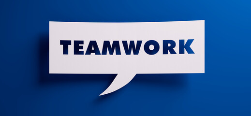 White speech bubble with the word teamwork in front of a blue colored wall - 3D illustration