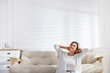 © New Africa - Portrait of beautiful smiling at home. Space for text