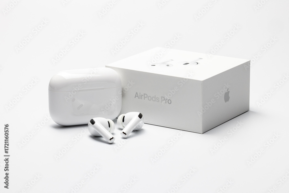 Apple AirPods Pro 3 and charging case next to packaging box on ...