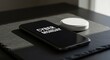© Volha - Smartphone displaying Cyber Monday text on dark surface indoors