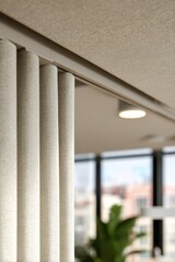 Wall Mural - Modern office interior design with elegant textured curtains and natural light
