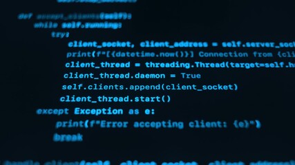 Close-up of blue programming code on a black computer screen. Concept of artificial intelligence, cyber security, or machine learning.