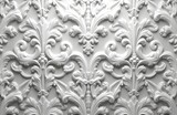 Intricate embossed white plaster features floral arabesque patterns. Ornate, seamless swirls mimic rococo, baroque styles, creating luxurious, elegant, antique surface decoration. Perfect for retro