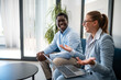© Zoran Jesic - Business colleagues sharing ideas during meeting conversation