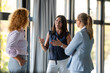 © Zoran Jesic - Businesswomen discussing ideas during informal meeting in office