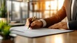 © EvgeniiasArt - businessman signing document in modern office blurred background professionalism and strategy in corporate settings