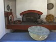 © Michael Rucker/imageBROKER - Taverna Kali Limni with traditional cuisine with wood-fired oven, ceramics and rustic style, blue element in the foreground, hike to the top of Kali Limni, Kali Limni, Lastos, Karpathos, Greece