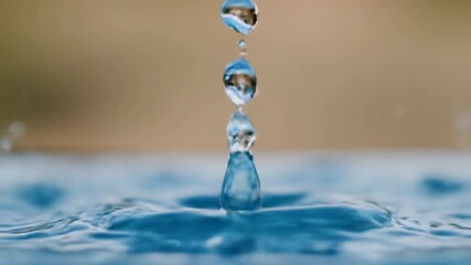 Wall Mural - Beautifully lit slow motion water splash forming a graceful crown shape as droplets refract light, shot with a telephoto lens and soft focus meditation, shape, abstract