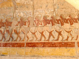 Relief of soldier procession at the Mortuary Temple of Hatshepsut in Luxor Egypt