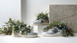© Mahbub stock  - Silver sneakers adorned with lush greenery for a stylish display