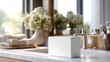 © jj's aura - White box mockup on bathroom counter with flowers and toiletries for product presentation and branding display