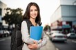 © BillionPhotos.com - Woman student portrait at university campus.