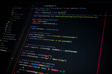 Close-up of code on dark screen showing component setup with store, provider injection, and computed properties, representing modern web development, data handling, and clean software engineering.