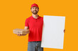 © Pixel-Shot - Male courier with pizza boxes and blank poster on yellow background