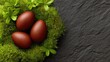 © pinporn manosri - Rustic Composition of Brown Eggs Nestled on Green Moss with Dark Stone Background for Seasonal and Natural Themes in Culinary and Decorative Contexts