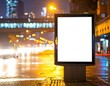 © Jam - Blank billboard at night. City street blurred background