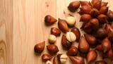 A close-up shot showcases a cluster of salak fruit, whole and peeled, on light wood.