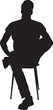 © Curto - vector,silhouette of front view of a man sitting on chair looking at camera arms akimbo, cross legged