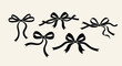 © Mugi - Elegant black ribbon bows in various dynamic arrangements perfect for festive decoration, gift wrapping, and premium branding accents