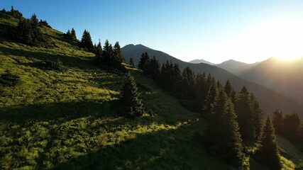 Wall Mural - Mesmerizing timelapse capturing long shadows creeping across sunny lush green mountain slopes at day's end afternoon, calm, mountains