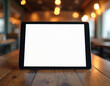 © miss irine - Modern tablet with blank screen on wooden cafe table, cozy interior. Device display template, design presentation for app, website, cyberspace communication, online business work. Hot drink relax