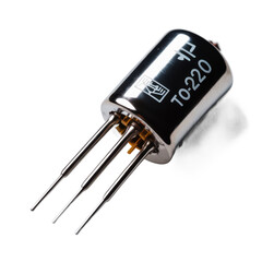 Shiny metal electronic component to 220 package with three pins isolated on transparent background