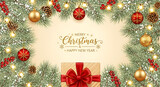 Festive Christmas garland with ornaments, fairy lights, pinecones, and a gift box.