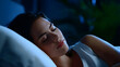 © pkproject - A person resting comfortably in a serene, dimly lit bedroom, enjoying a tranquil and restorative sleep