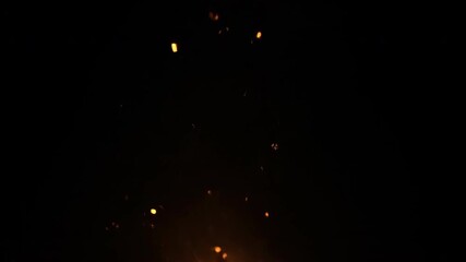 Sticker - golden embers rise and glow in a gentle, ethereal dance against a black night sky element, dynamic, 