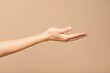 © Galang - A fair-skinned woman's arm and hand are outstretched, palm up, against a muted beige backdrop.  The image is clean and simple, focusing on the gesture of offering or receiving