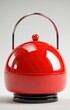© Hutan - Red, rounded, glossy, decorative, ceramic, or metal, lidded container with a handle
