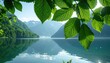 © dany - Peaceful mountain lake through leaves