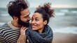 © DreamGrid - Loving couple enjoying a romantic moment at the beach.