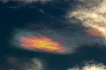 Wall Mural - colorful metalic in the blue sky and white clouds, nature series