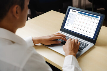 Wall Mural - Calendar on computer software application for modish schedule planning for personal organizer and online business