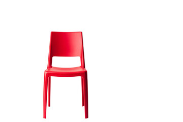 Vibrant red plastic chair isolated on a clean background for modern design projects
