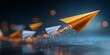 © Rifqi - Golden paper plane leading a group on a path with shining effect and dark backdrop, concept for leadership aspiration, innovation direction and business strategy progress