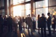 © Irtiko - Dynamic business networking event with blurred attendees in a bright, modern space, perfect for corporate communications and showcasing company culture, creating a sense of vibrancy and connection