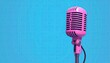 © Tutup - Pink retro microphone against vibrant blue
